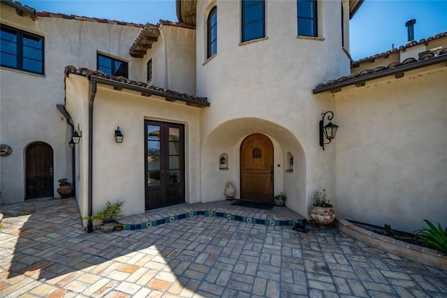 4950 Davenport Creek Rd, San Luis Obispo, CA 93401 - entrance to property featuring french doors, stucco siding, and a patio area