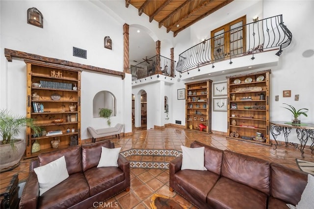 4950 Davenport Creek Rd, San Luis Obispo, CA 93401 - tiled living room with a high ceiling and arched walkways