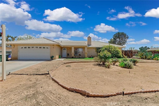 21919 Standing Rock Ave, Apple Valley, CA 92307 - ranch-style house featuring a tile roof, an attached garage, and stucco siding