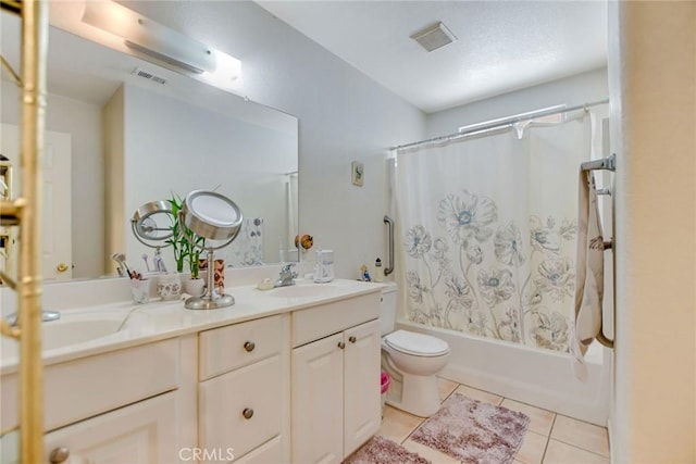 21919 Standing Rock Ave, Apple Valley, CA 92307 - full bathroom with double vanity, tile patterned flooring, toilet, and shower / bath combination with curtain