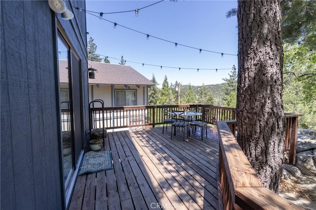 33310 Conway Dr, Running Springs, CA 92308 - wooden deck featuring outdoor dining space