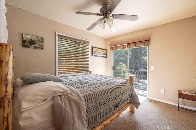 745 Sunset Ln, Sugarloaf, CA 92386 - bedroom with access to outside, a textured wall, carpet, baseboards, and a ceiling fan