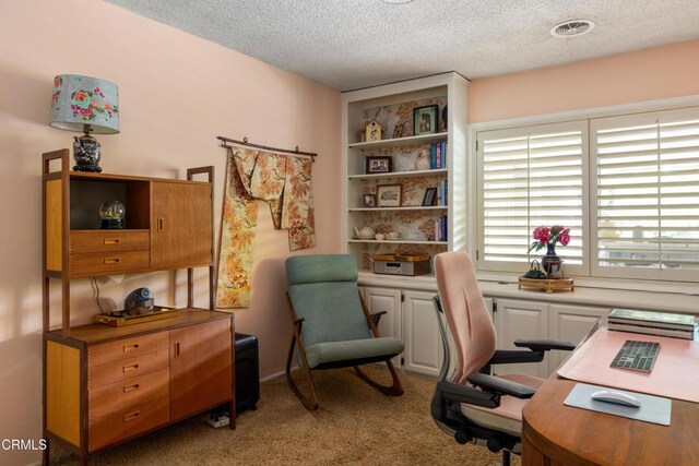 85 Gardenia Ct, Upland, CA 91786 - home office with a textured ceiling and light carpet