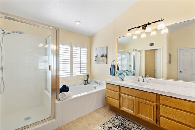 2811 N Preston St, Orange, CA 92867 - full bath featuring a stall shower, vanity, a bath, vaulted ceiling, and tile patterned flooring