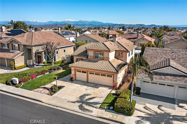 2811 N Preston St, Orange, CA 92867 - view of front of property featuring a residential view, driveway, stucco siding, a tile roof, and a mountain view