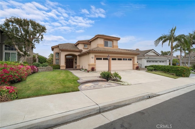 2811 N Preston St, Orange, CA 92867 - mediterranean / spanish-style house with stucco siding, a tile roof, a front yard, driveway, and a garage