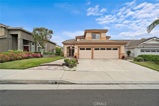 2811 N Preston St, Orange, CA 92867 - mediterranean / spanish-style home with stucco siding, a tiled roof, concrete driveway, an attached garage, and a front yard