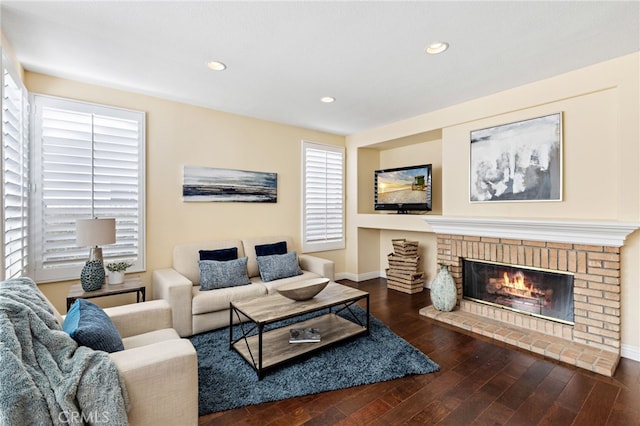 2811 N Preston St, Orange, CA 92867 - living area featuring wood finished floors, baseboards, a fireplace, and recessed lighting