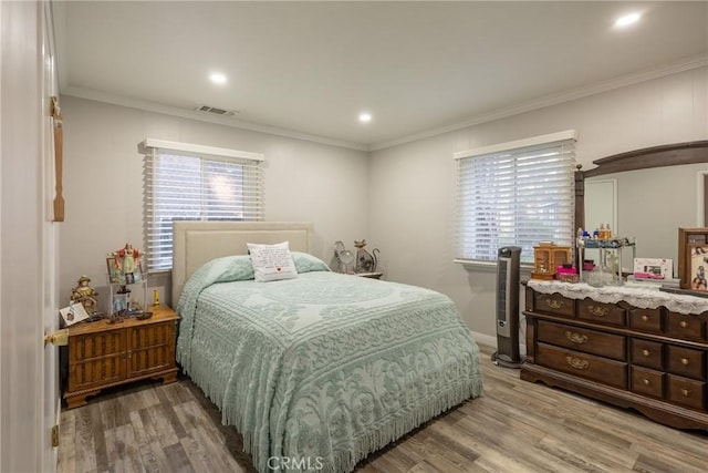 913 W Rainbow Blvd, Big Bear City, CA 92314 - bedroom featuring light wood-type flooring, crown molding, recessed lighting, and baseboards