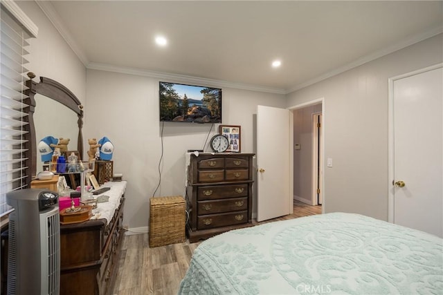 913 W Rainbow Blvd, Big Bear City, CA 92314 - bedroom with wood finished floors, ornamental molding, baseboards, and recessed lighting