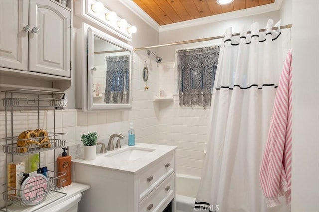913 W Rainbow Blvd, Big Bear City, CA 92314 - full bathroom with decorative backsplash, vanity, shower / tub combo, tile walls, and ornamental molding