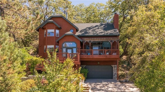 1315 Sequoia Dr, Lake Arrowhead, CA 92352 - rustic home featuring driveway, an attached garage, a chimney, and a shingled roof