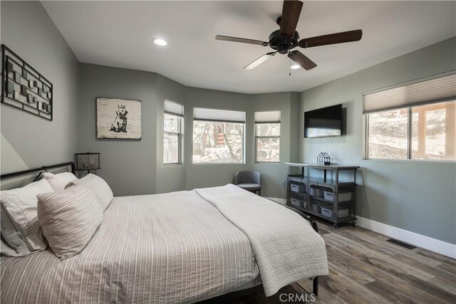 1315 Sequoia Dr, Lake Arrowhead, CA 92352 - bedroom featuring multiple windows, wood finished floors, baseboards, recessed lighting, and ceiling fan