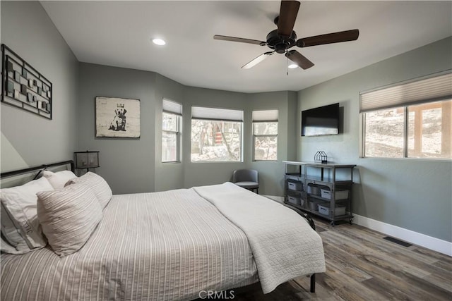 1315 Sequoia Dr, Lake Arrowhead, CA 92352 - bedroom featuring multiple windows, wood finished floors, recessed lighting, and ceiling fan