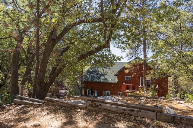1315 Sequoia Dr, Lake Arrowhead, CA 92352 - view of yard with a wooden deck