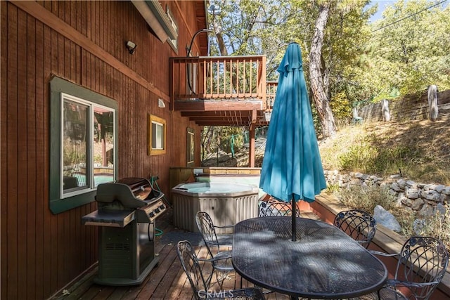 1315 Sequoia Dr, Lake Arrowhead, CA 92352 - wooden terrace with a hot tub, a grill, and outdoor dining area