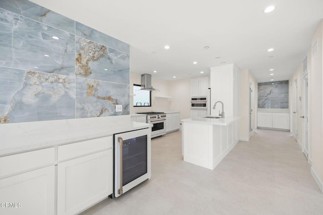 1194 Kingston Ln, Ventura, CA 93001 - kitchen with beverage cooler, gas range, a sink, island range hood, and oven