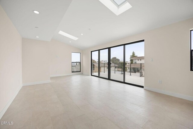 1194 Kingston Ln, Ventura, CA 93001 - unfurnished room featuring vaulted ceiling, a skylight, baseboards, and recessed lighting