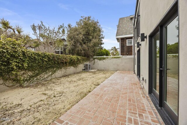 1194 Kingston Ln, Ventura, CA 93001 - fenced backyard featuring a patio area and central AC unit