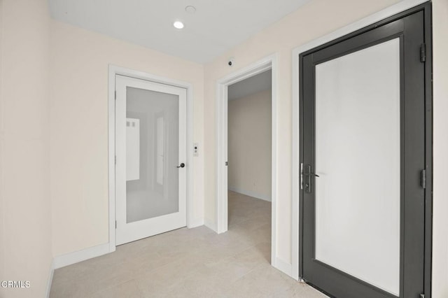1194 Kingston Ln, Ventura, CA 93001 - hallway featuring baseboards, light tile patterned floors, and recessed lighting