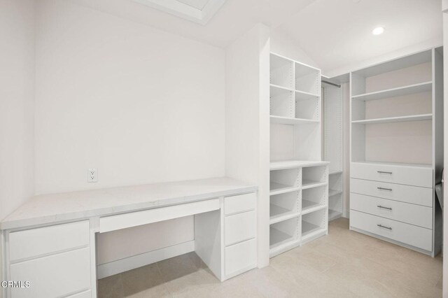 1194 Kingston Ln, Ventura, CA 93001 - spacious closet featuring built in study area and vaulted ceiling
