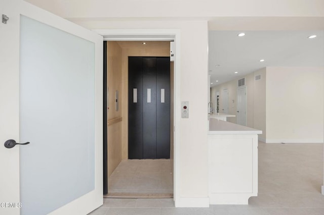 1194 Kingston Ln, Ventura, CA 93001 - hall with elevator, recessed lighting, and light tile patterned flooring
