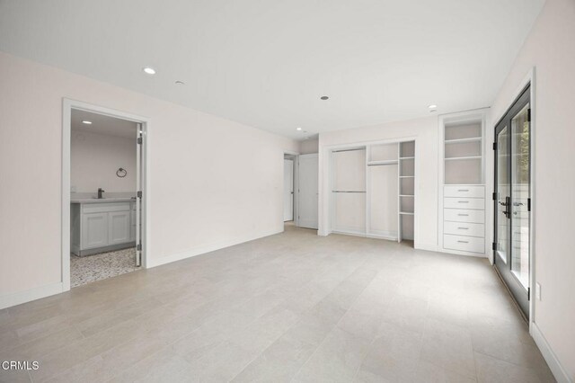 1194 Kingston Ln, Ventura, CA 93001 - unfurnished bedroom featuring recessed lighting, a sink, ensuite bathroom, baseboards, and access to outside