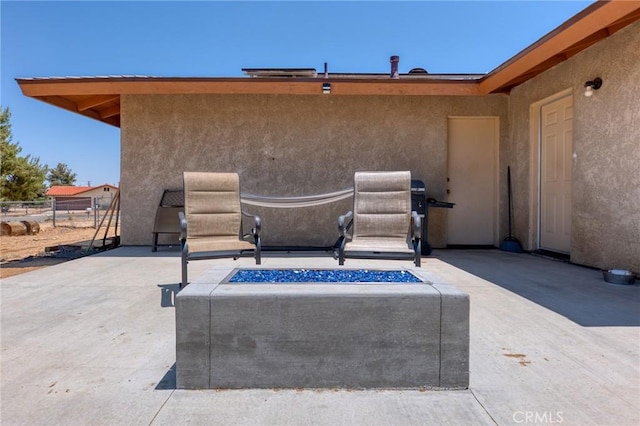 8600 San Vicente Dr, Yucca Valley, CA 92284 - view of patio / terrace with a fire pit