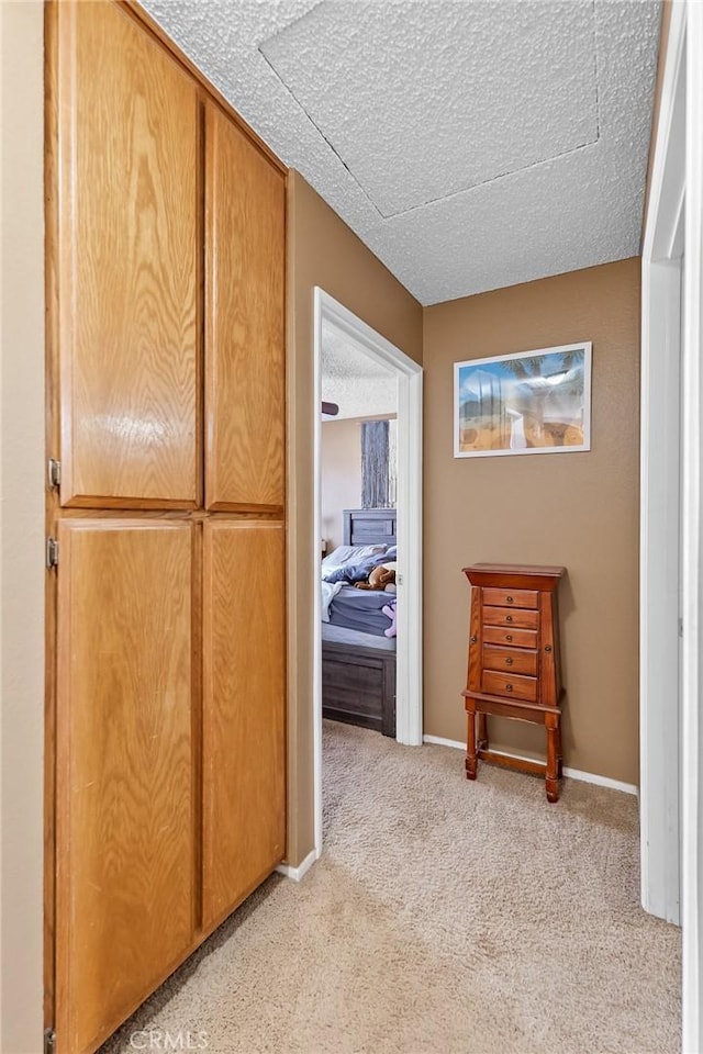 8600 San Vicente Dr, Yucca Valley, CA 92284 - hallway featuring carpet flooring and baseboards