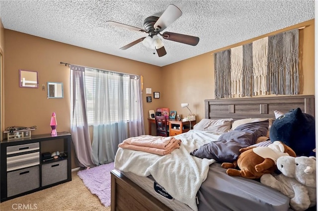 8600 San Vicente Dr, Yucca Valley, CA 92284 - bedroom featuring carpet floors, a textured ceiling, and a ceiling fan