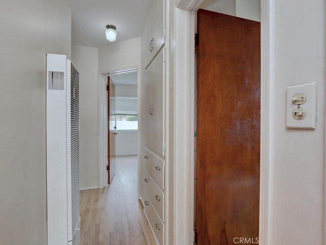 4265 Crescent Ave, Cypress, CA 90630 - hall featuring a heating unit and light wood-style flooring