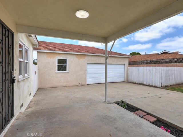 4265 Crescent Ave, Cypress, CA 90630 - view of patio / terrace featuring a garage