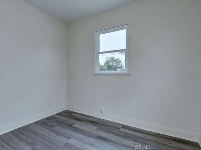 4265 Crescent Ave, Cypress, CA 90630 - unfurnished room featuring baseboards and dark wood finished floors