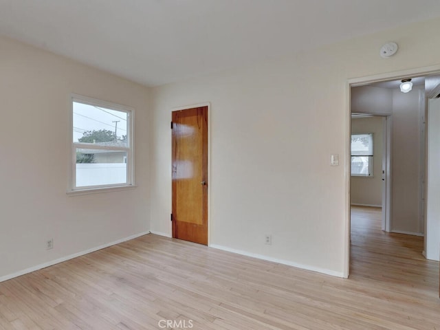 4265 Crescent Ave, Cypress, CA 90630 - spare room with light wood finished floors, a smoke detector, and baseboards