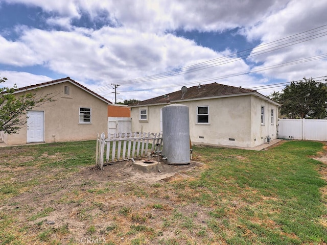 4265 Crescent Ave, Cypress, CA 90630 - back of property featuring crawl space and stucco siding