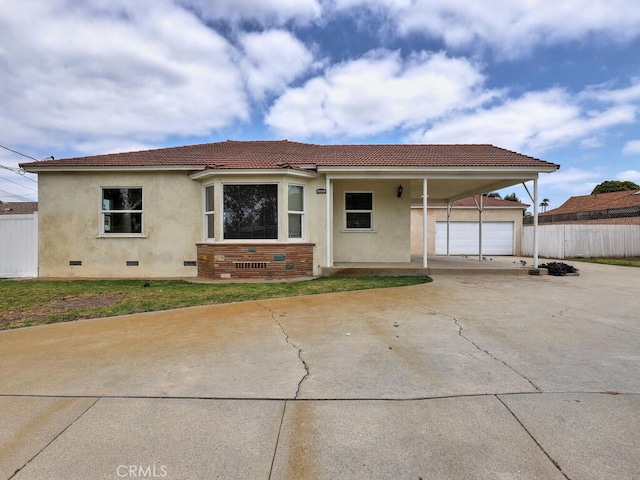 4265 Crescent Ave, Cypress, CA 90630 - view of front facade with a tiled roof, concrete driveway, stucco siding, an attached garage, and crawl space