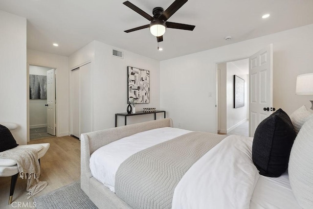 6101 Fulton Ave Unit 8, Van Nuys, CA 91401 - bedroom with recessed lighting, light wood-style flooring, baseboards, a closet, and a ceiling fan