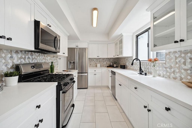 6101 Fulton Ave Unit 8, Van Nuys, CA 91401 - kitchen with stainless steel appliances, a sink, light tile patterned flooring, and light countertops