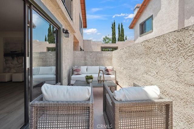 6101 Fulton Ave Unit 8, Van Nuys, CA 91401 - view of patio with an outdoor hangout area and a balcony