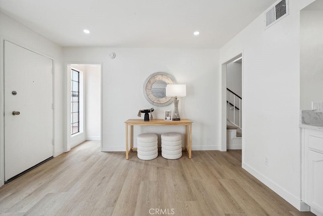 6101 Fulton Ave Unit 8, Van Nuys, CA 91401 - foyer featuring light wood-style floors, stairs, baseboards, and recessed lighting