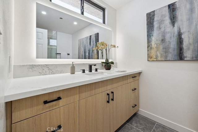 6101 Fulton Ave Unit 8, Van Nuys, CA 91401 - bathroom featuring vanity, baseboards, and tile patterned floors