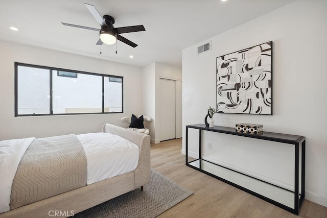 6101 Fulton Ave Unit 8, Van Nuys, CA 91401 - bedroom featuring light wood-style flooring, recessed lighting, baseboards, a closet, and a ceiling fan