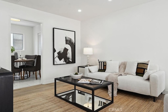6101 Fulton Ave Unit 8, Van Nuys, CA 91401 - living area with light wood finished floors, recessed lighting, and baseboards