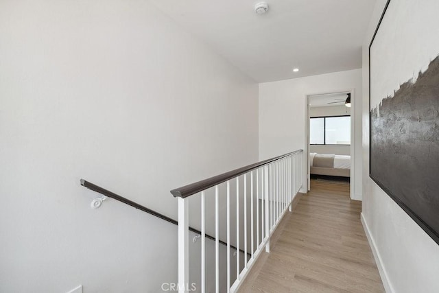 6101 Fulton Ave Unit 8, Van Nuys, CA 91401 - hall featuring an upstairs landing, light wood-style flooring, and baseboards
