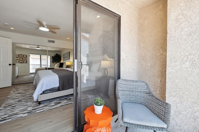 6101 Fulton Ave Unit 8, Van Nuys, CA 91401 - bedroom with wood finished floors, a closet, and ceiling fan