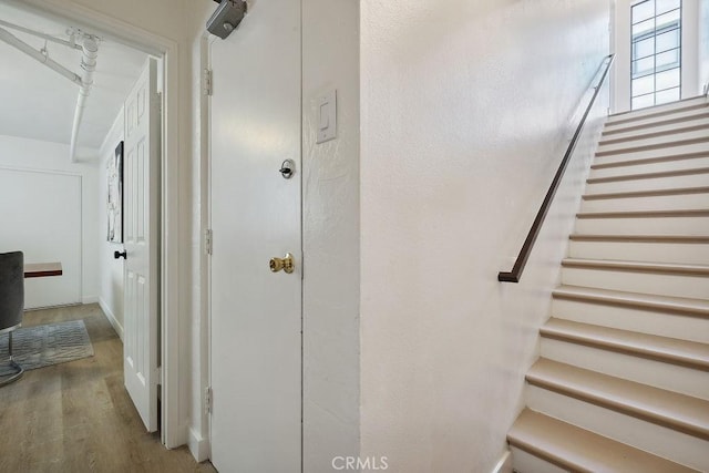 6101 Fulton Ave Unit 8, Van Nuys, CA 91401 - staircase with wood finished floors