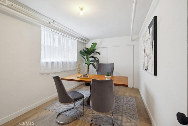 6101 Fulton Ave Unit 8, Van Nuys, CA 91401 - dining area featuring baseboards, wood finished floors, and an office area