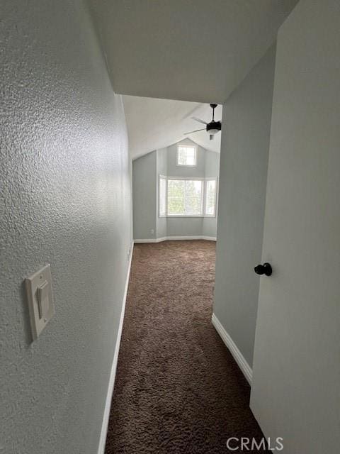 2015 Lakeridge Cir Unit 301, Chula Vista, CA 91913 - hallway featuring carpet, baseboards, and lofted ceiling