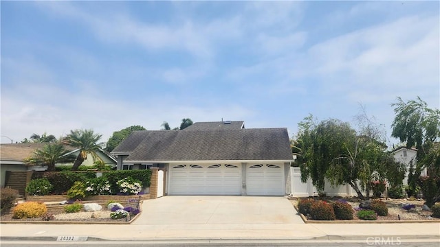 20392 Densmore Ln, Huntington Beach, CA 92646 - view of front of property with a garage and concrete driveway