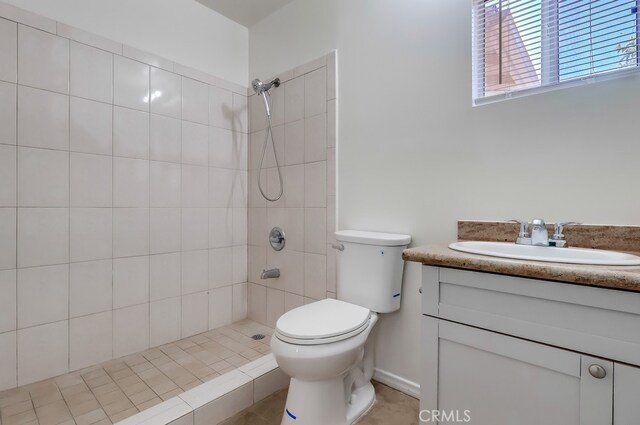 18417 Santar St, Rowland Heights, CA 91748 - bathroom with toilet, vanity, and a tile shower